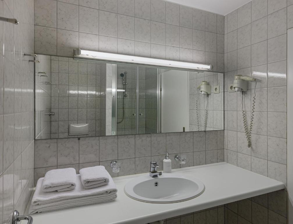 Koupelna v ubytování Hotel Nova