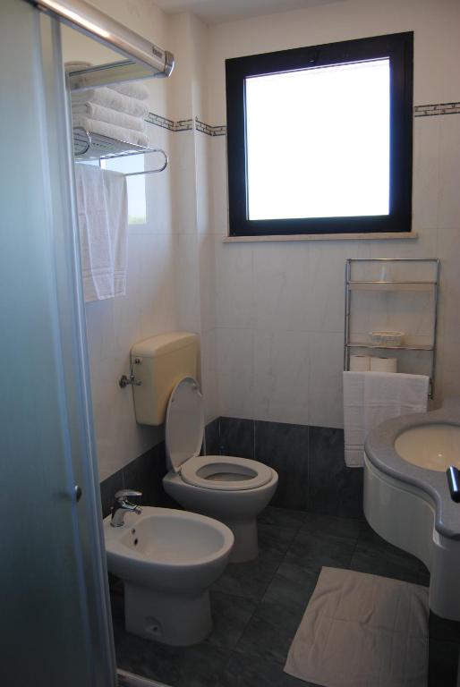 Koupelna v ubytování Hotel Capriccio