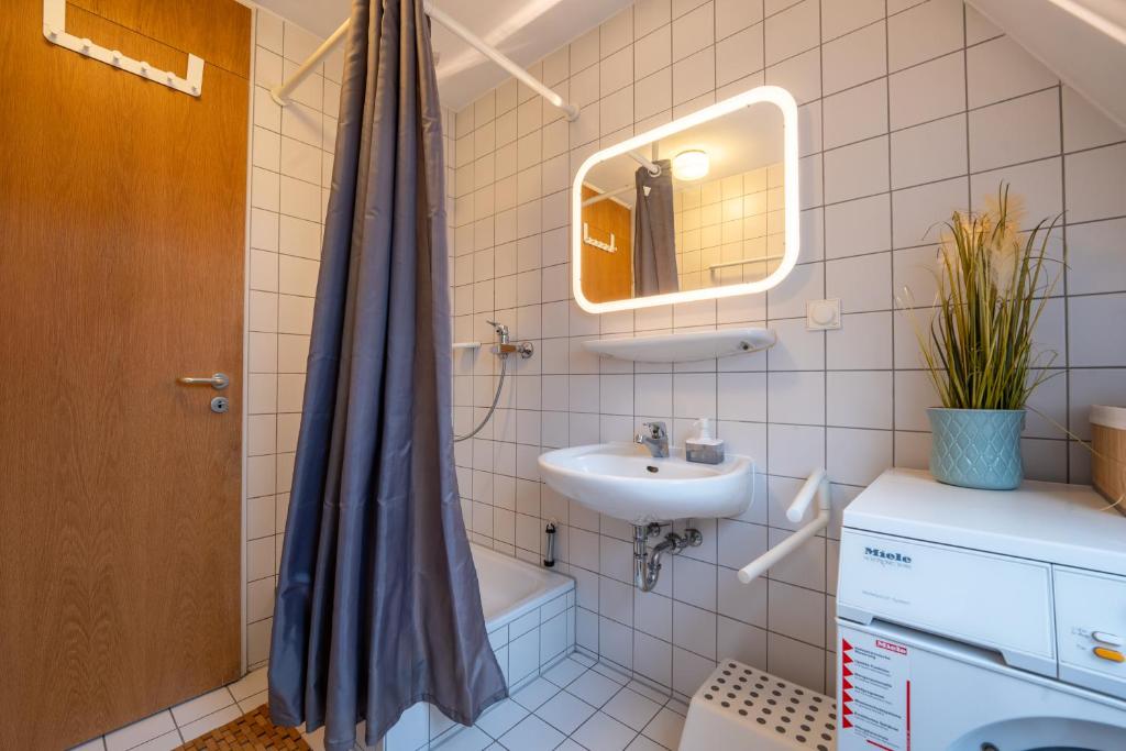 Koupelna v ubytování Apartment im Historischen Altbau am Marktplatz - Disney+, 300mb/s Internet