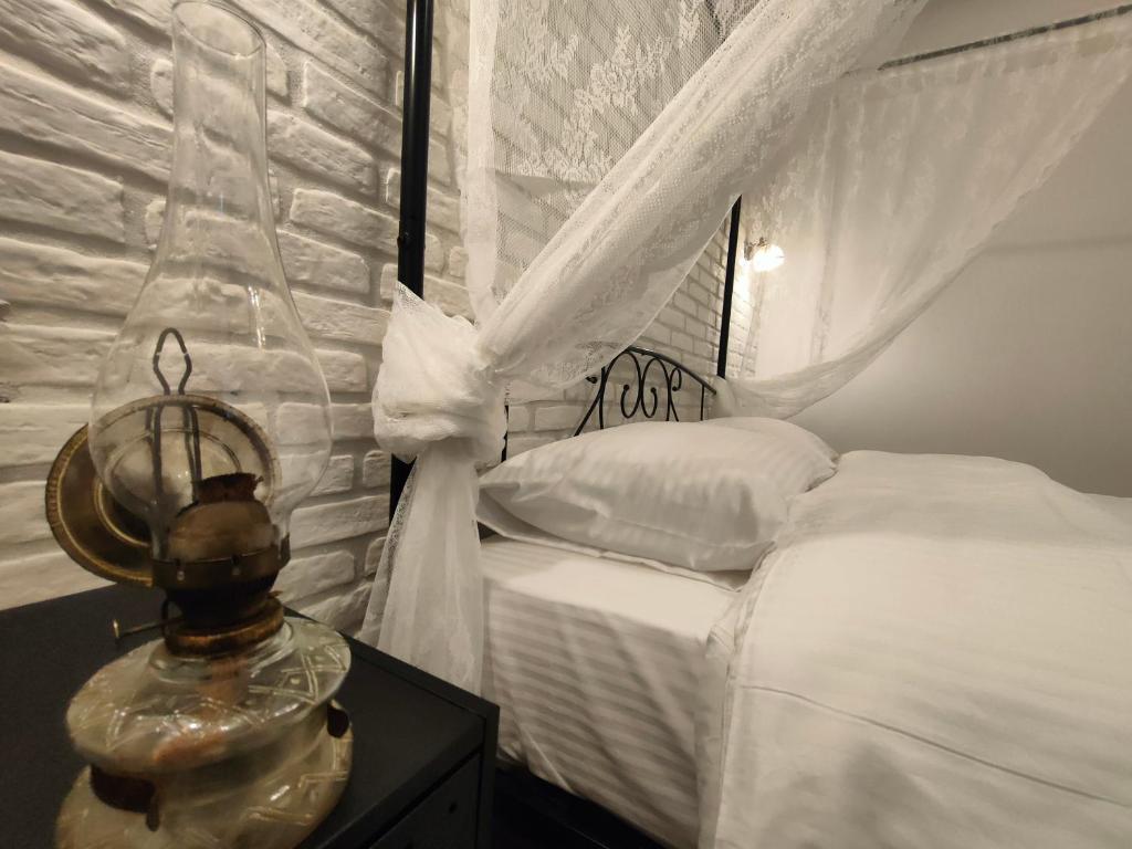 Posteľ alebo postele v izbe v ubytovaní Vintage apartment Helios