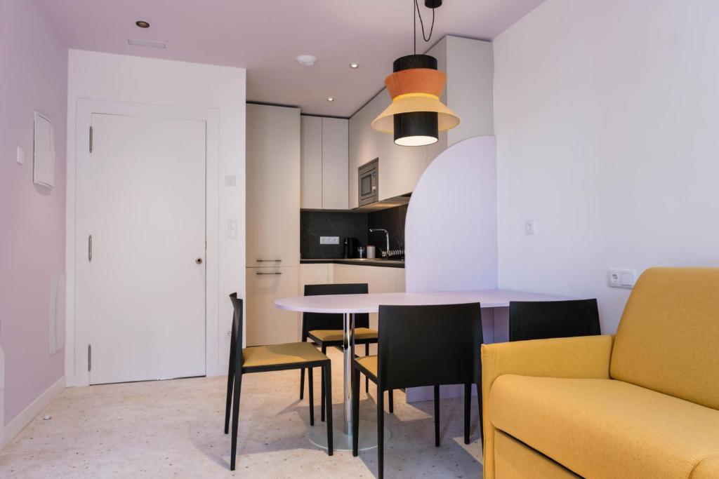 Kuchyň nebo kuchyňský kout v ubytování Apartamentos El Reloj