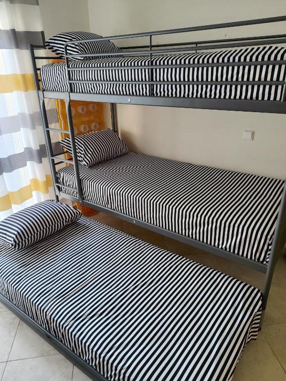Postel nebo postele na pokoji v ubytování ΛΕΛΑ
