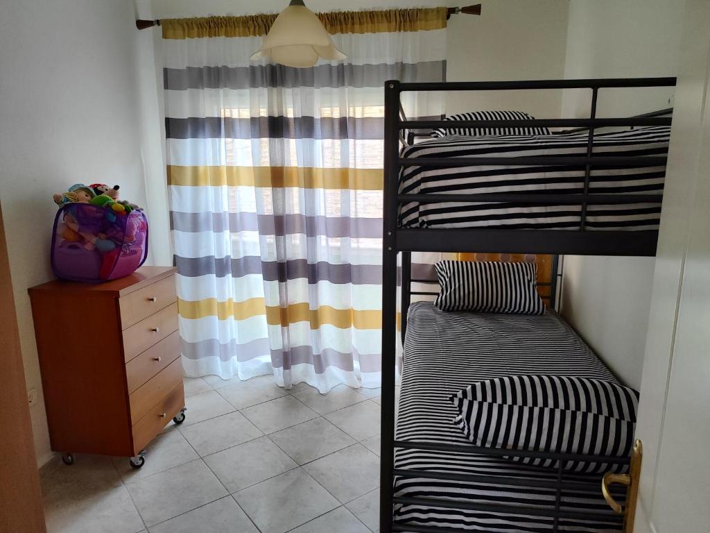 Postel nebo postele na pokoji v ubytování ΛΕΛΑ