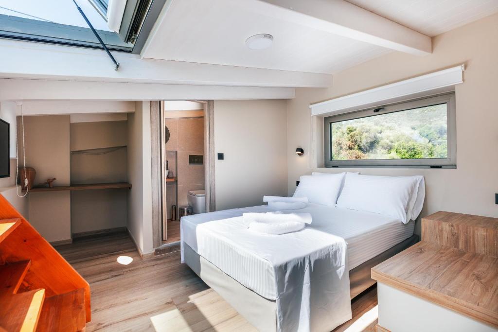 Postel nebo postele na pokoji v ubytování Isla Villas & Suites