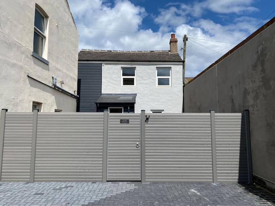 a gate in front of a house with a fence at The Old Warehouse in Blackpool