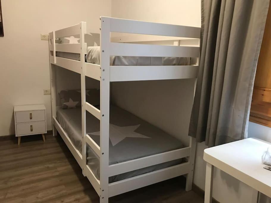 Кровать или кровати в номере La clau de la vall