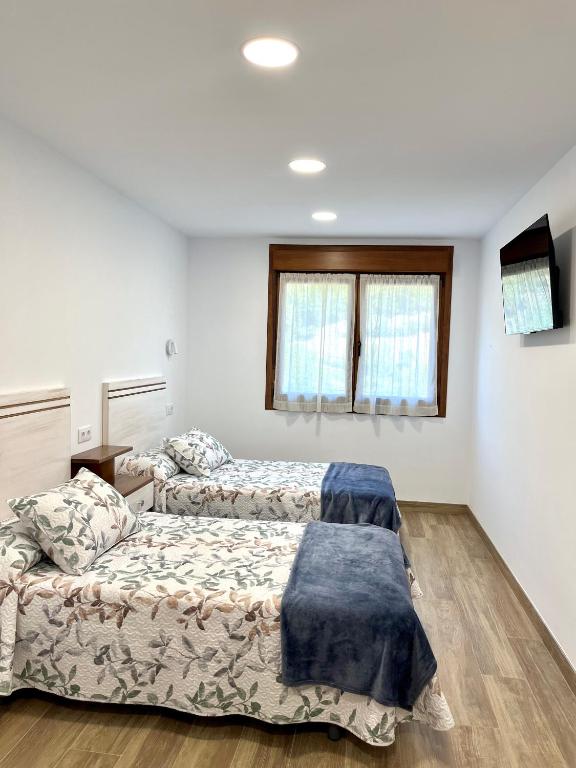 Postel nebo postele na pokoji v ubytování Apartamento Valbuena
