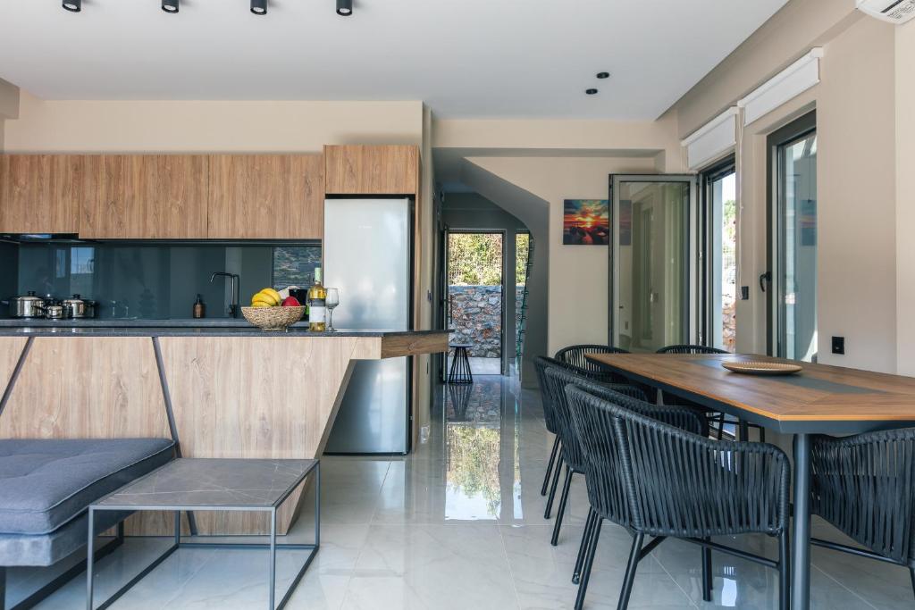 Kuchyň nebo kuchyňský kout v ubytování Isla Villas & Suites