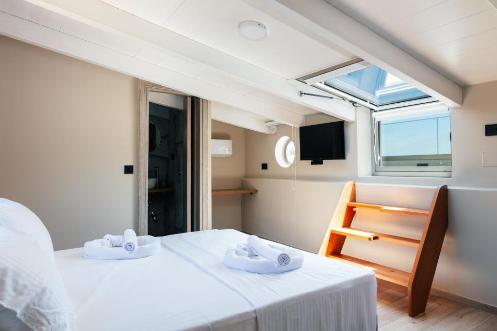 Postel nebo postele na pokoji v ubytování Isla Villas & Suites