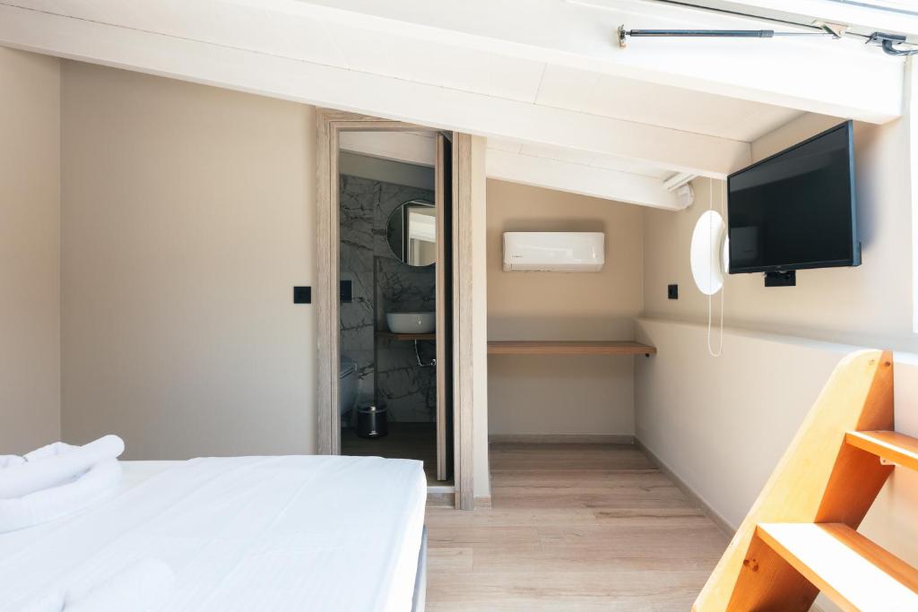 Postel nebo postele na pokoji v ubytování Isla Villas & Suites