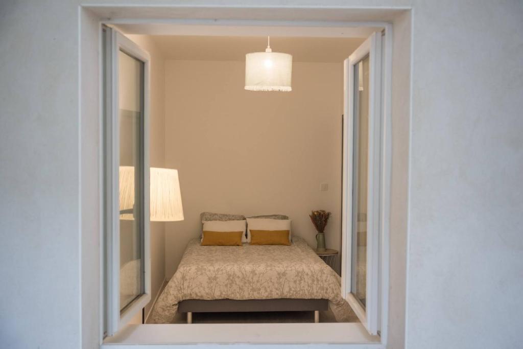 Poste&#x13E; alebo postele v izbe v ubytovan&iacute; T2 avec terrasse