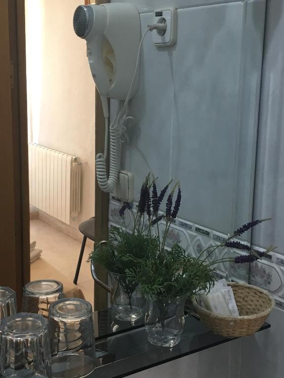Kuchyň nebo kuchyňský kout v ubytování Hostal R. Lido
