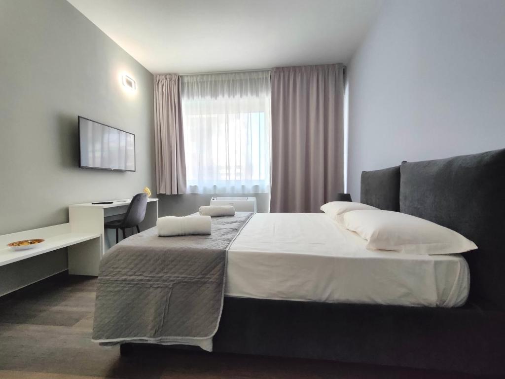Postel nebo postele na pokoji v ubytování Nine Sweet Rooms