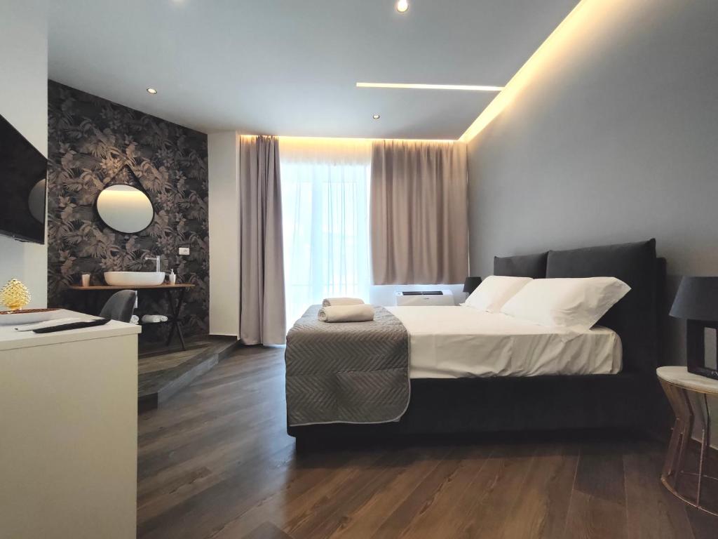 Postel nebo postele na pokoji v ubytování Nine Sweet Rooms