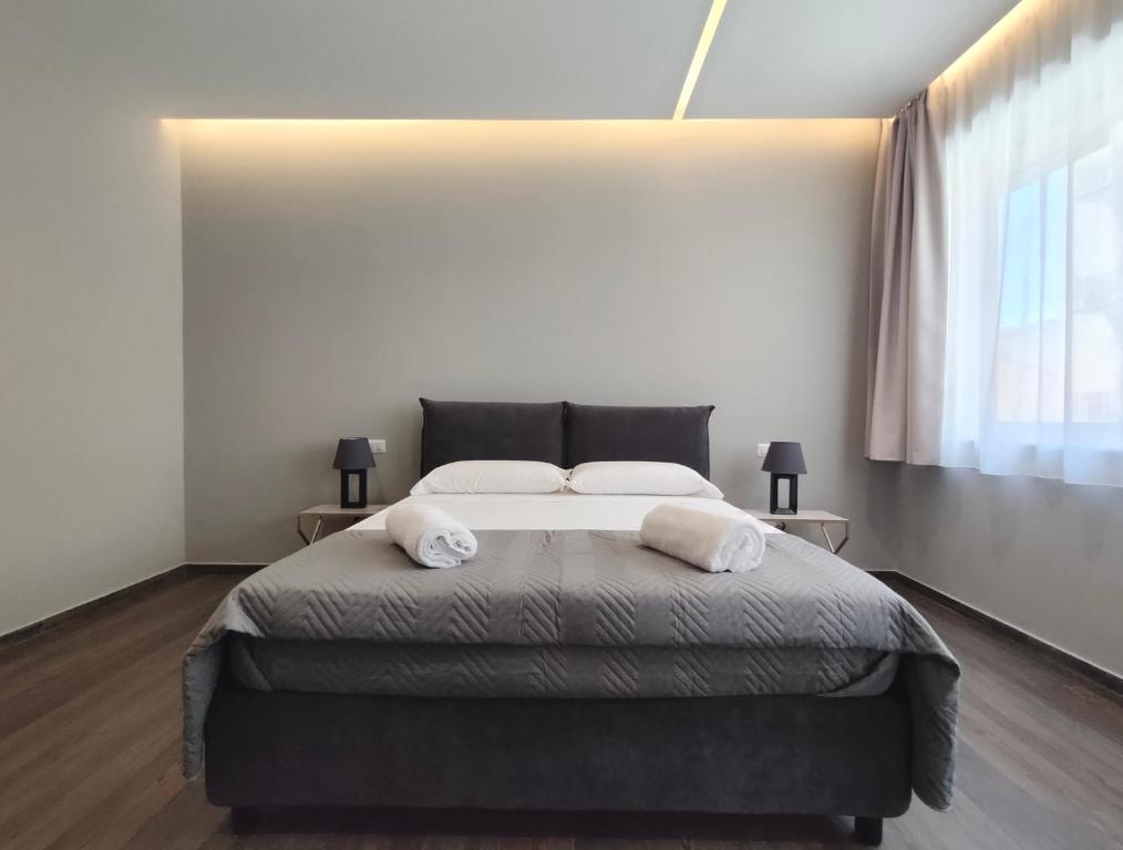Postel nebo postele na pokoji v ubytování Nine Sweet Rooms