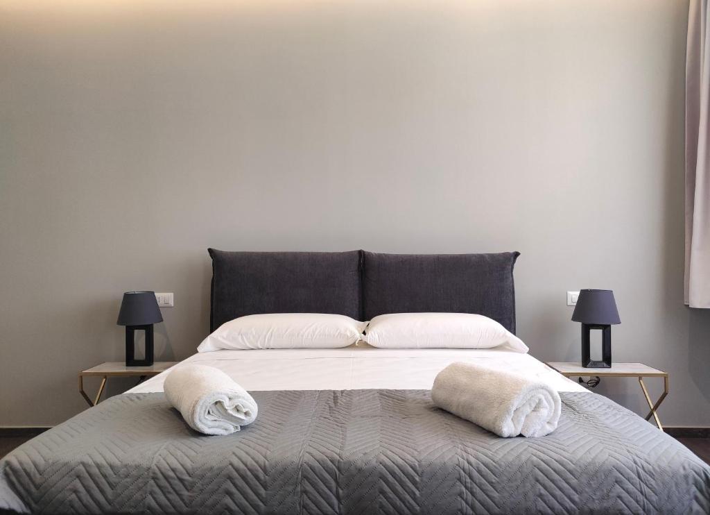 Postel nebo postele na pokoji v ubytování Nine Sweet Rooms