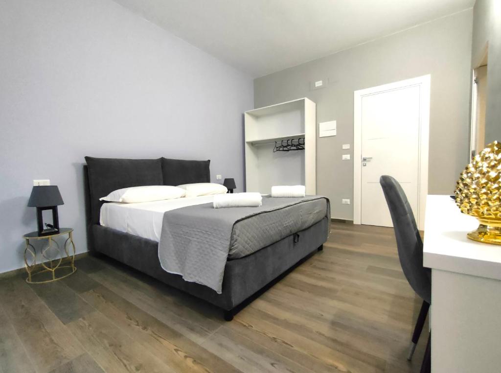 Postel nebo postele na pokoji v ubytování Nine Sweet Rooms