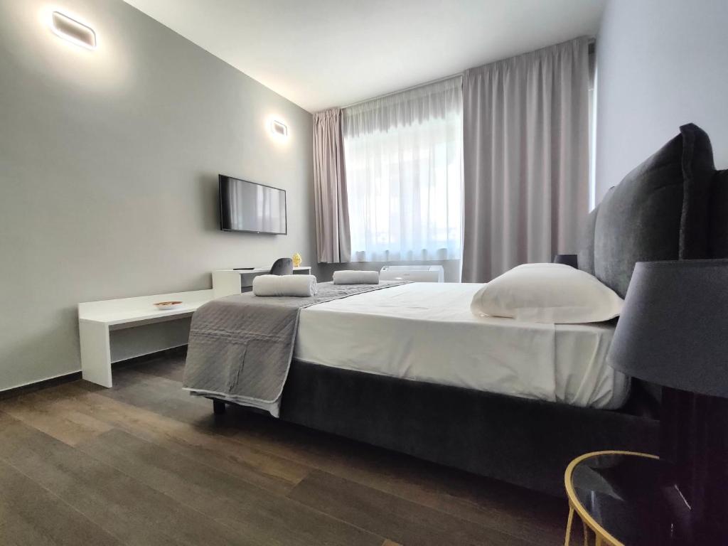 TV a/nebo společenská místnost v ubytování Nine Sweet Rooms