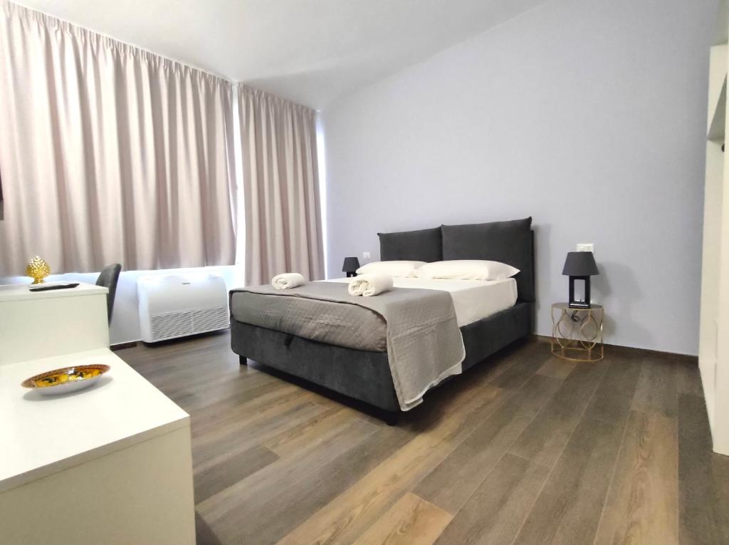 Postel nebo postele na pokoji v ubytování Nine Sweet Rooms