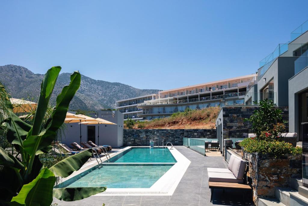 Bazén v ubytování Isla Villas & Suites nebo v jeho okolí