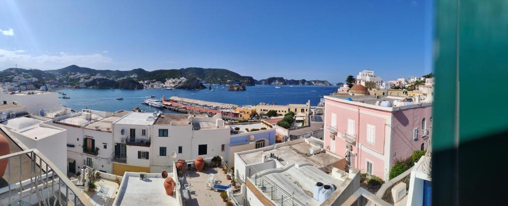a view of a city with a river and buildings at VisitPonza - Olimpo in Ponza
