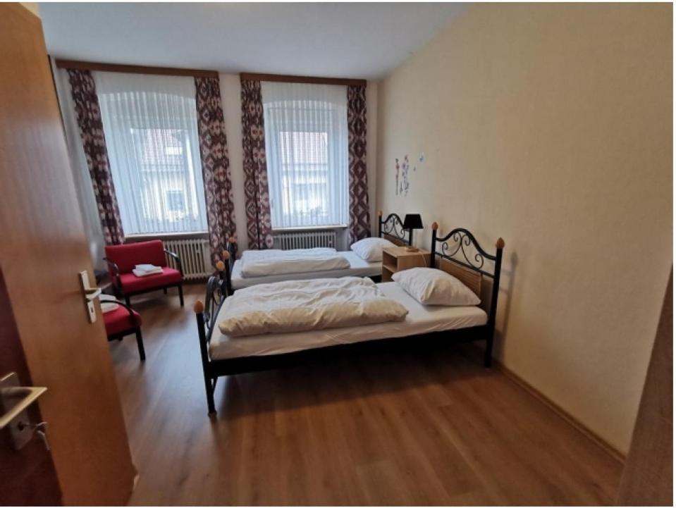 Postel nebo postele na pokoji v ubytování Gasthaus Schürmann