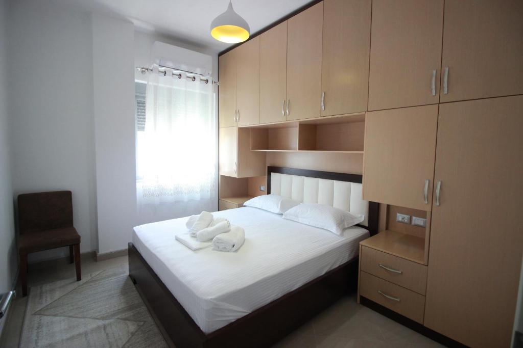 Postel nebo postele na pokoji v ubytování Muko's Apartments