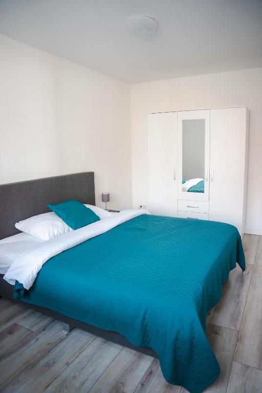 Postel nebo postele na pokoji v ubytování The Residence Enschede