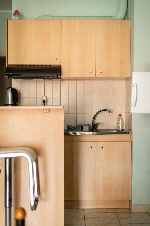 Kuchnia lub aneks kuchenny w obiekcie Central Cozy Apartment 2