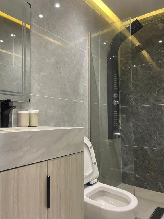 Koupelna v ubytování Oqdeh Delux Apartments