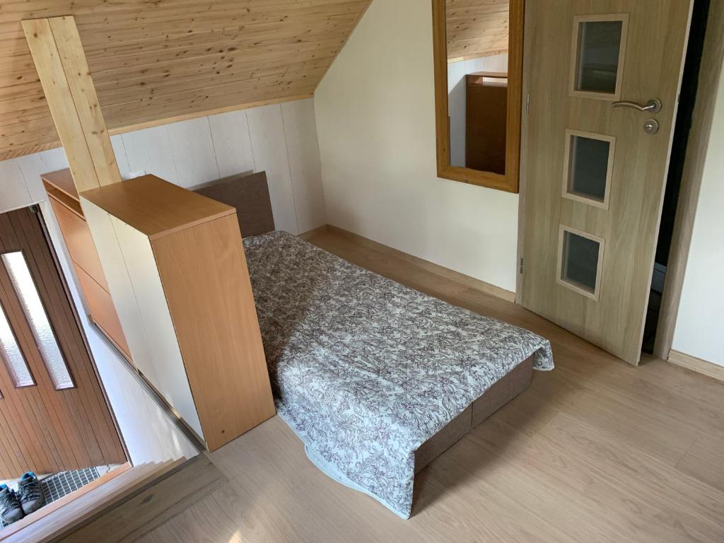 Postel nebo postele na pokoji v ubytování Klidné a vyjímečné ubytování nad sklepem - Přítluky Garance na počasí!!!