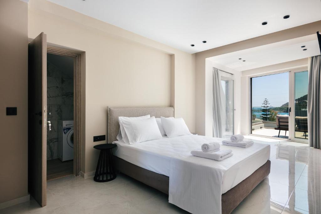 Postel nebo postele na pokoji v ubytování Isla Villas & Suites