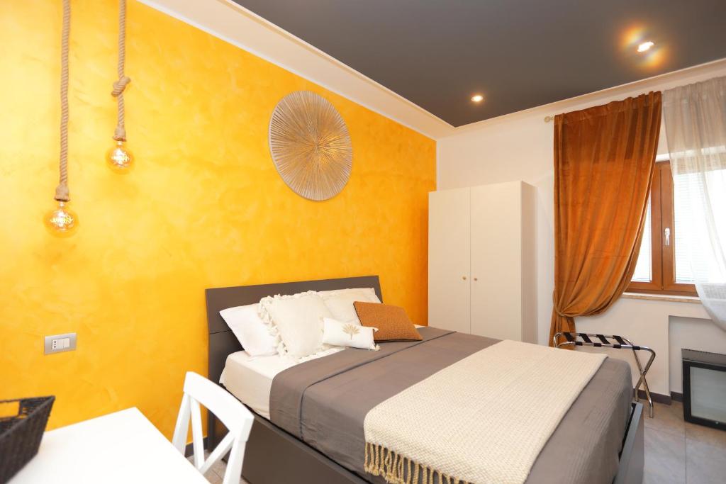 Postel nebo postele na pokoji v ubytování Luxe sur Mer B&B Sorrento