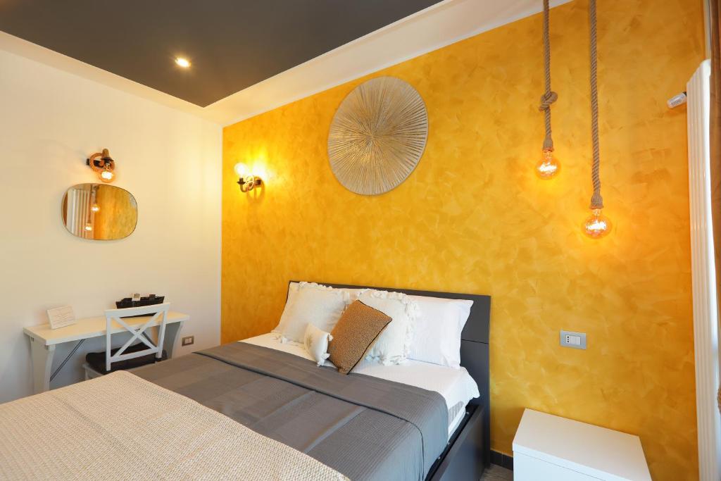 Postel nebo postele na pokoji v ubytování Luxe sur Mer B&B Sorrento
