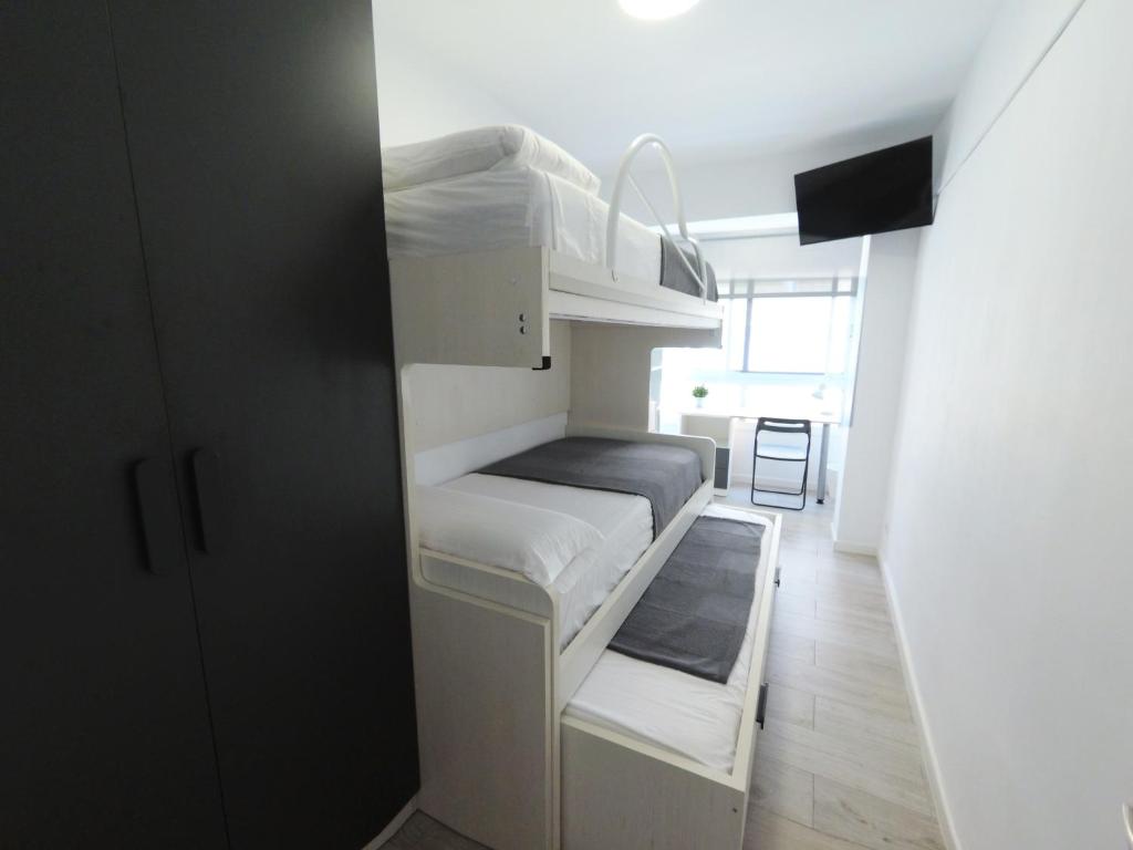 Kuchyň nebo kuchyňský kout v ubytování Apartamento New Tarraco