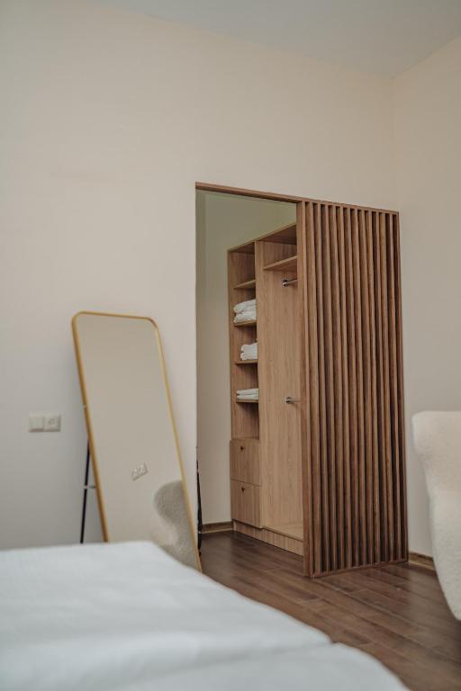 Postel nebo postele na pokoji v ubytování Kera Rooms