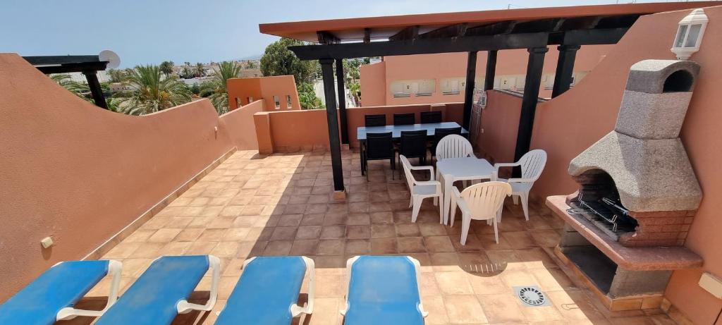 Balkón nebo terasa v ubytování Homes of Spain, Apartamentos Paraiso , Ed Palmerston, Atico K a pie de playa, piscina privada en solarium, WiFi