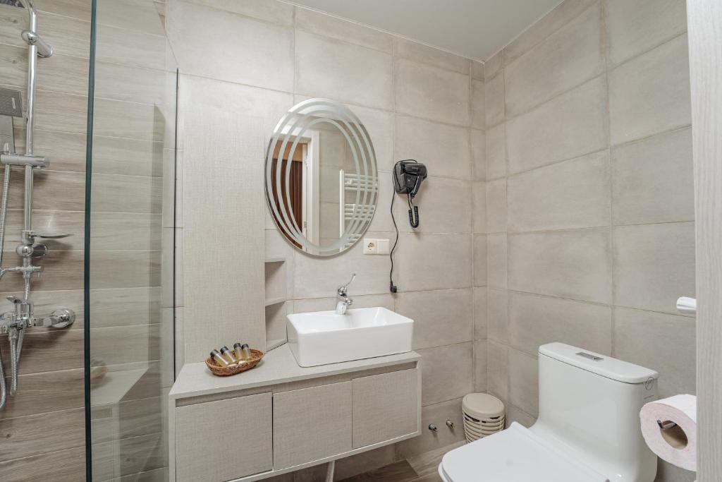 Koupelna v ubytování Kera Rooms