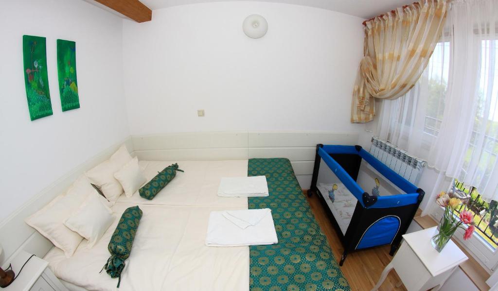Postel nebo postele na pokoji v ubytování Mazurja