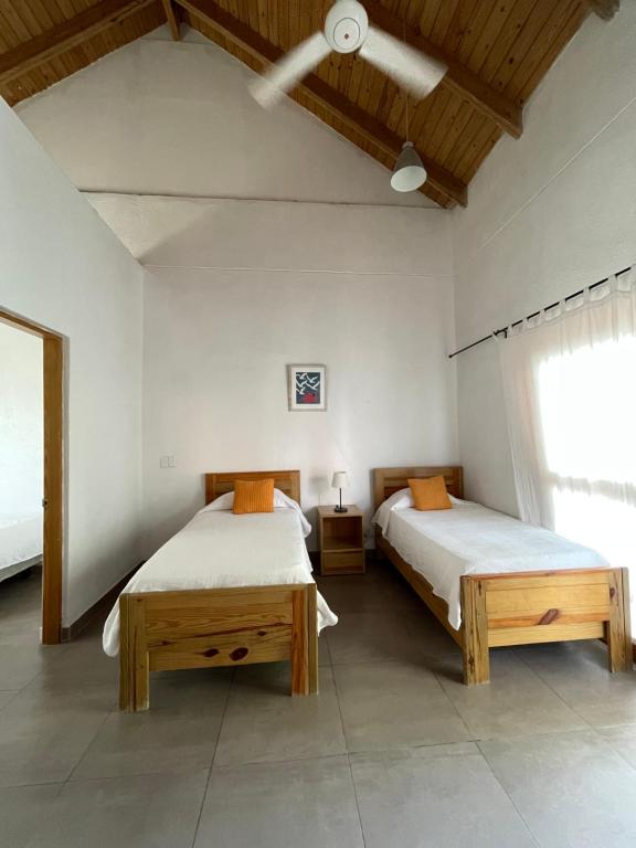 Postel nebo postele na pokoji v ubytování Altos de la Caobita