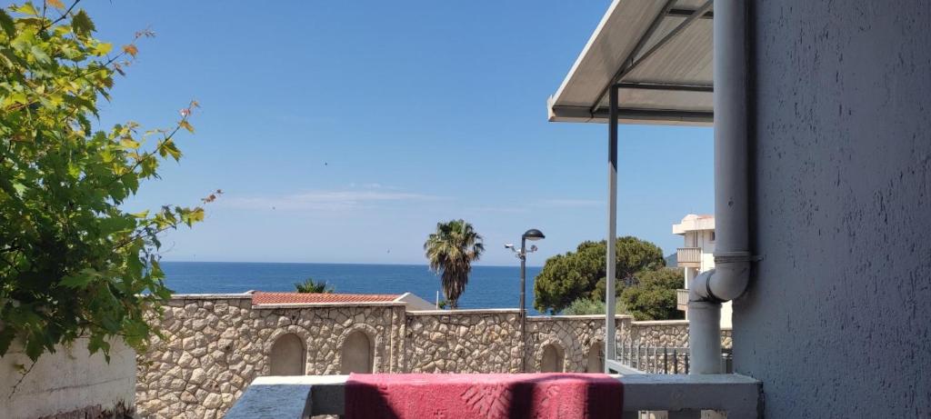a view of the ocean from a building at Terasse by the sea in Sutomore