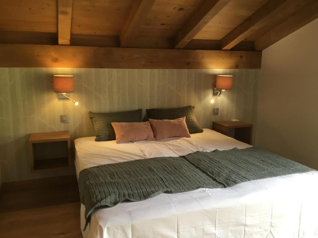 Postel nebo postele na pokoji v ubytování Chalet du Feug