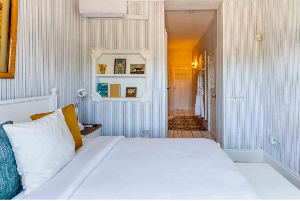 Postel nebo postele na pokoji v ubytování The Pearl - Marbella