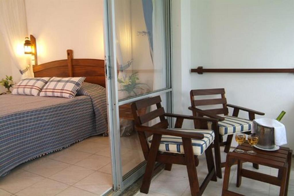 Postel nebo postele na pokoji v ubytování Voyager Beach Resort