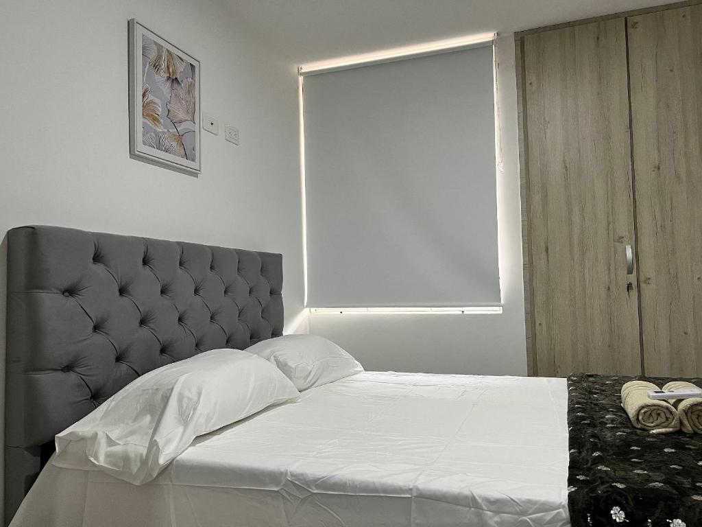 Postel nebo postele na pokoji v ubytování Río Guatapuri y Confort Deluxe
