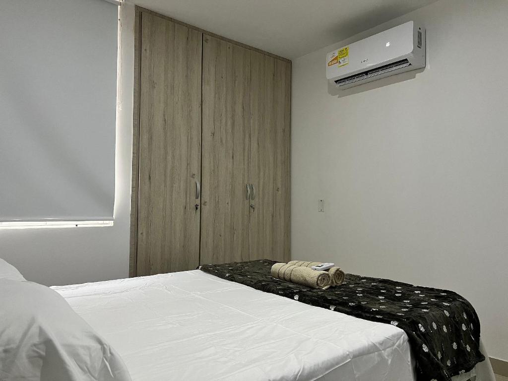 Postel nebo postele na pokoji v ubytování Río Guatapuri y Confort Deluxe