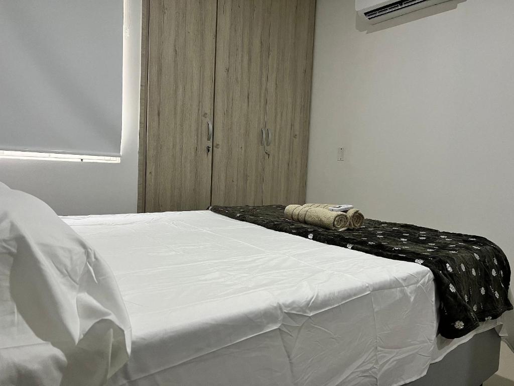 Postel nebo postele na pokoji v ubytování Río Guatapuri y Confort Deluxe