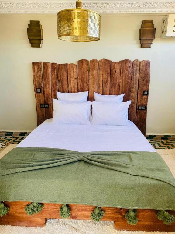 Postel nebo postele na pokoji v ubytování Riad Casa nomad
