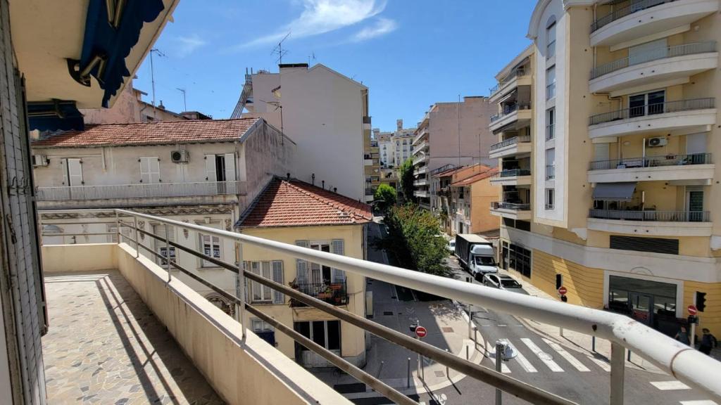 a view of a city street from a balcony at New two bedroom apartment with AC by the sea in Nice