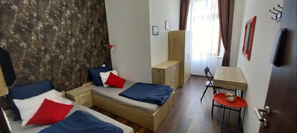 Postel nebo postele na pokoji v ubytování Klauzal 14